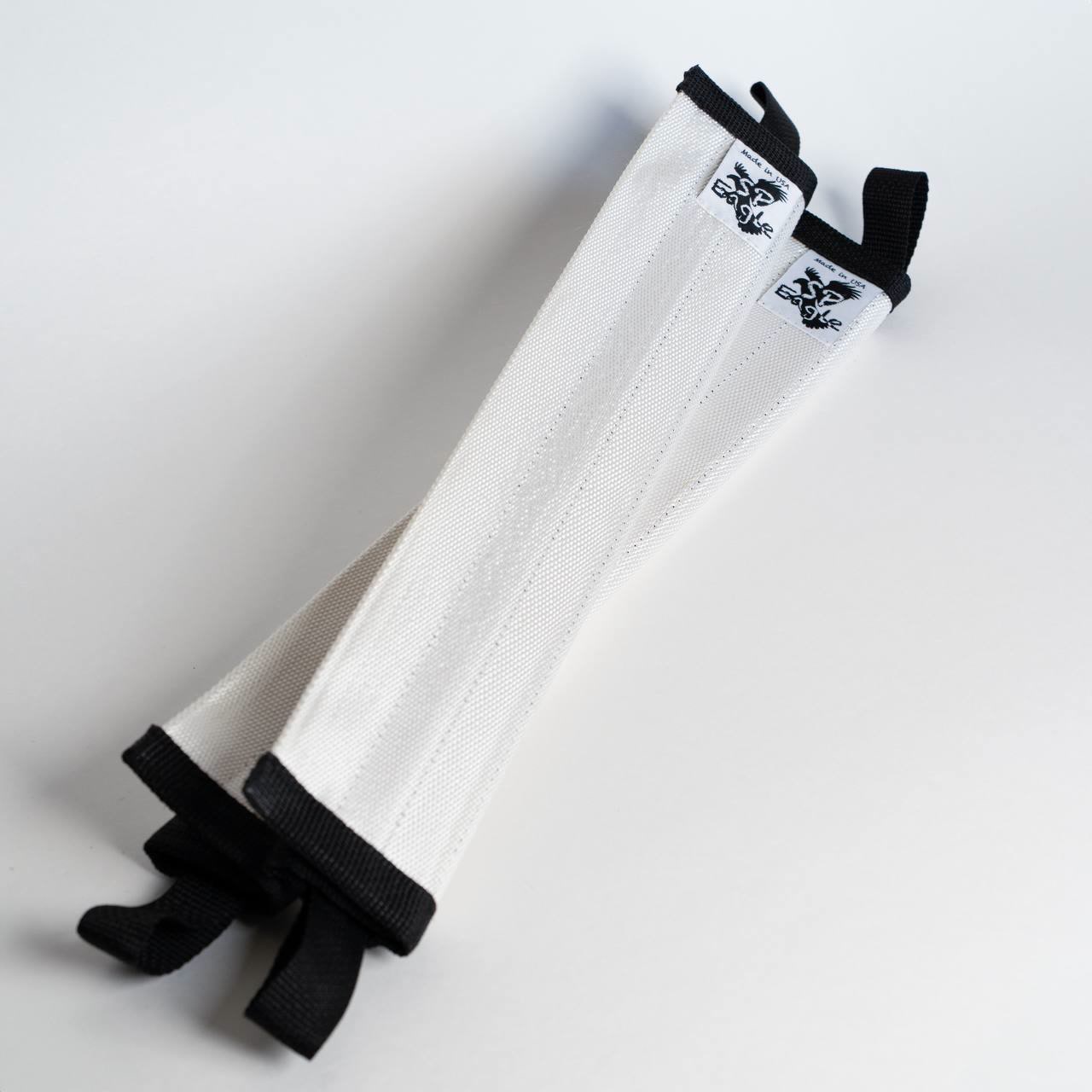 Two rope protectors photographed in a studio